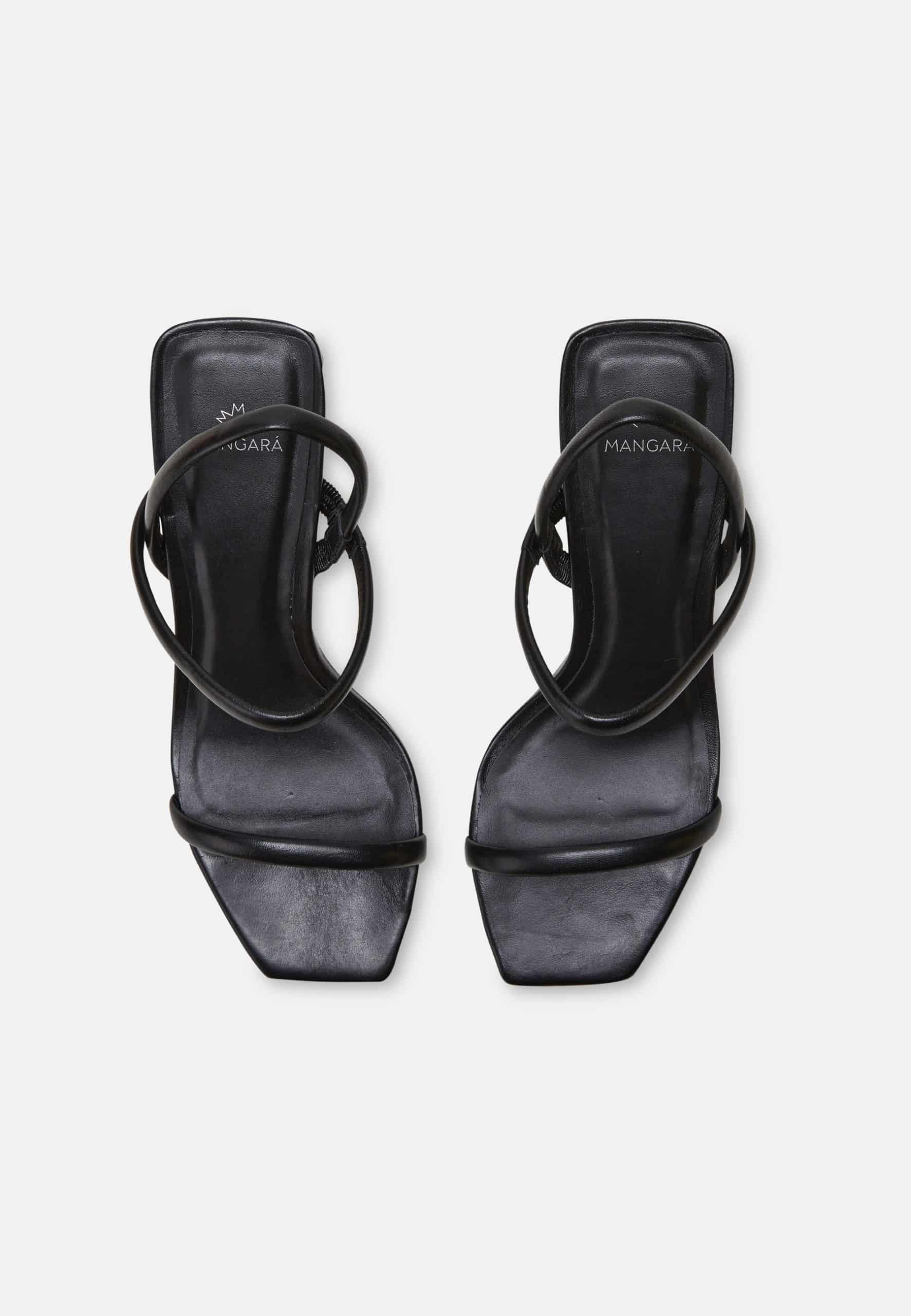 Elegant Mangará Palmito Sandals featuring a 6.5cm block heel, crafted from luxurious goat leather with an open-toe design and two-way strap.